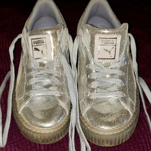 Size 7.5 Silver Puma shoes donating soon